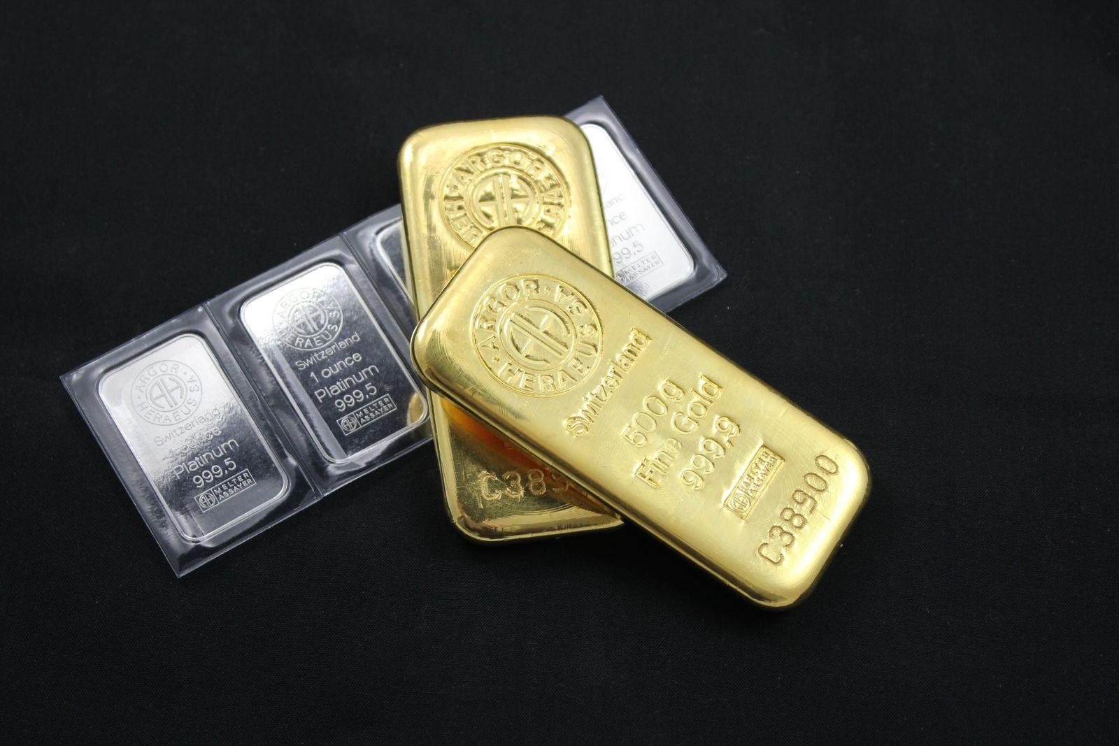 Lingotti d'oro e d'argento